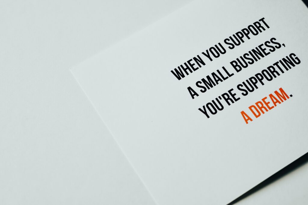 Support Small Business written on a card; Harv Communications